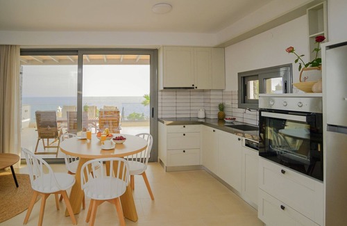 Mavros Kolimpos Villa | Seafront 4-bedroom Villa Grand Blue in Mavros Kolimpos with lovely sea views!