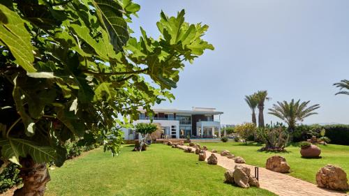 Pegeia Villa | Seafront Villa Kyma by Ezoria Villas