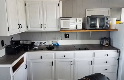 Oscoda House | Seas The Day Suite A SUITES A,B,C FOR SALE On the AuSable River