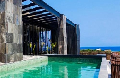Zona Hotelera Apartment | Seascape apartment near the beach with a sea-view rooftop and infinity pool