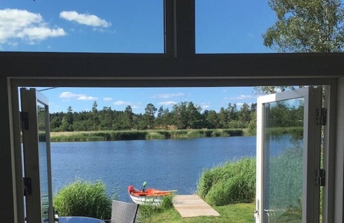 Tofta Cabin | Seaside cottage with private lake plot, jetty and boat