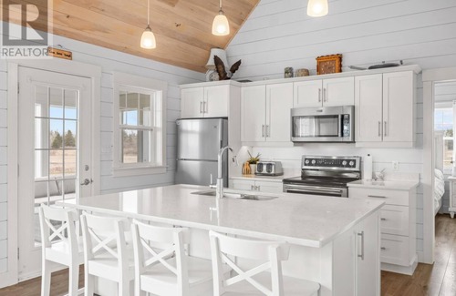 Murray Harbour North Cottage | Seaside Serenity: Your Perfect Coastal Retreat Awaits.