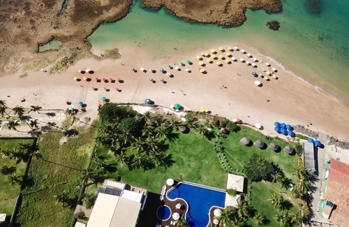 Parafuso Apartment | Seasonal rentals, right on the sand in the Paraíso dos Corais condominium in Guarajuba
