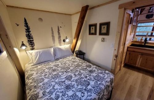 Luther Ski Chalet | Secluded A-Frame Cabin with Private Riverfront on Little Manistee River near Tustin, Michigan
