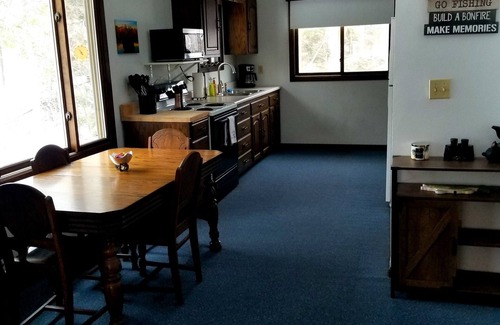 Elcho Cottage | Secluded cabin on a lake, right on snowmobile trail
