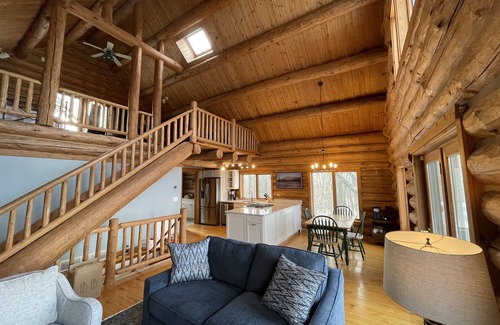 Lake Leelanau Cabin | Secluded Log Cabin Retreat on 11 Wooded Acres with Hot Tub & Lake Michigan Views