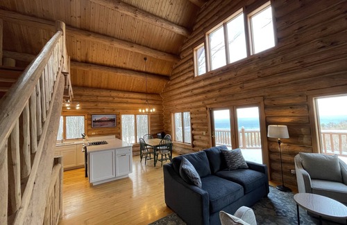 Lake Leelanau Cabin | Secluded Log Cabin Retreat on 11 Wooded Acres with Hot Tub & Lake Michigan Views