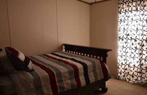Elmo House | Secluded Modest Cabin on Beautiful and Stocked Fishing Lake