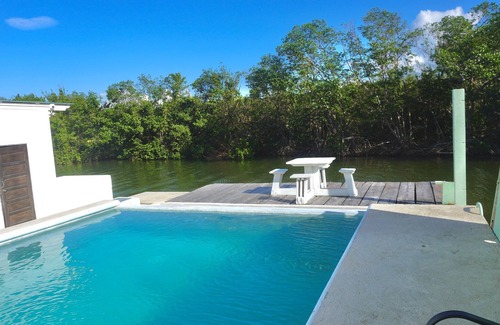 Belize City Apartment | See Belize SUNRISE 2-bed Studio, 1st Floor with Infinity Pool & Overwater Deck
