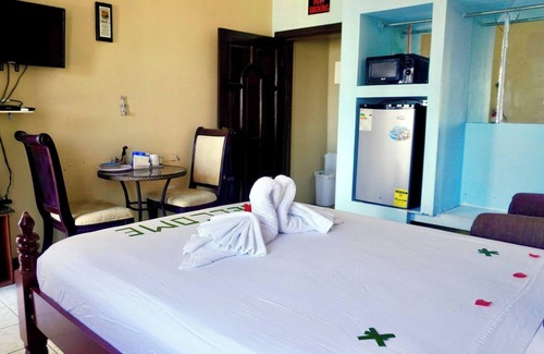 Belize City House | See Belize TRANQUIL SeaView Studio with Balcony, Pool, Deck & Kitchenette 2nd FL