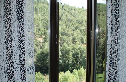 Vimioso House | Serapicos House - rustic house with private spa and views of the mountains and river.