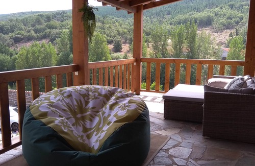 Vimioso House | Serapicos House - rustic house with private spa and views of the mountains and river.