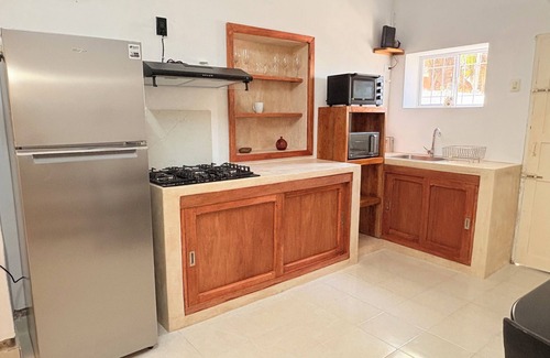 Chicxulub Puerto House | Serene 2-bedroom house with AC, pool & laundry station in Chicxulub Puerto