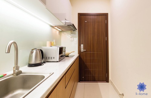Tan Binh Apartment | Serene apartment with AC in vibrant HCM, Near TSN Airport 1.3km, Kitchen, Washer