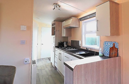 Hollum Ski Chalet | Serene Dune Chalet located between Golf Course and Beach
