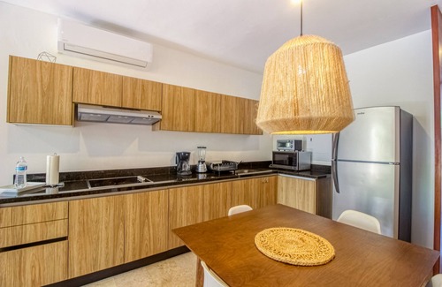 La Veleta Apartment | Serene, ground-floor getaway with private & shared pool, washer/dryer, & patio