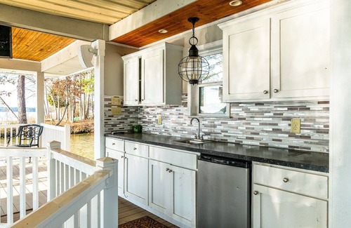Henrico House | Serene Lakefront Escape with Sunset Views, Private Boathouse, and Endless Fun!