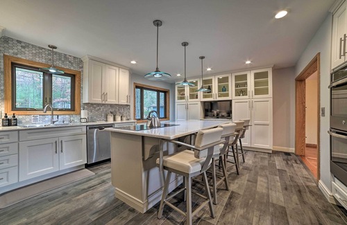 Rapid City House | Serene Riverfront Home w/Torch Lake Access!