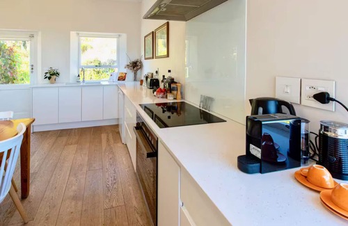 Hout Bay Villa | Serene Villa with Mountain & Ocean Views in a secure estate with Tennis Court!