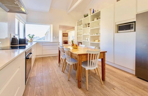 Hout Bay Villa | Serene Villa with Mountain & Ocean Views in a secure estate with Tennis Court!