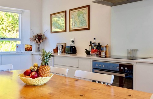 Hout Bay Villa | Serene Villa with Mountain & Ocean Views in a secure estate with Tennis Court!