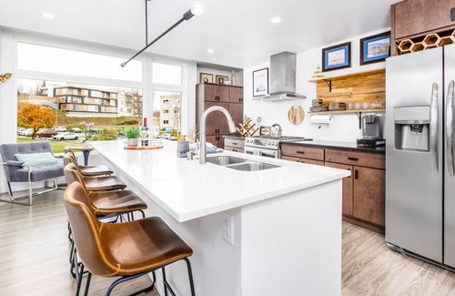 South Addition House | Serene waterfront townhouse with balcony, stunning views, dogs OK, fireplace