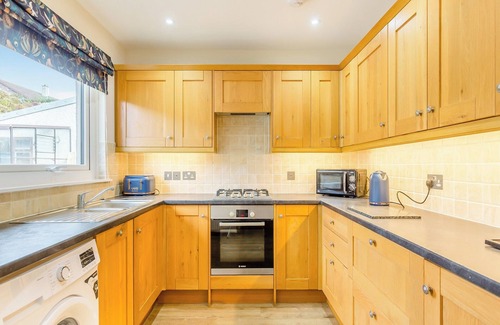 Fearn Cottage | Set in the village of Balintore, this spacious house offers an enclosed garden.