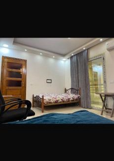 Nasr City House | Shared Twin Room with AC in Waha, Cairo