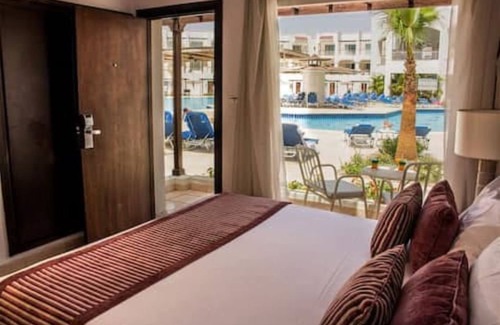 Sharm El Sheikh Resort | Sharm All-Inclusive Delights: Pools, Live Shows & Watersports