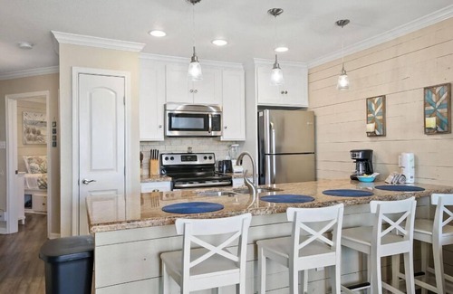 Galveston Condo | Shell We Dance! Updated, Stylish Condo with Beach View, Resort Pool and Hot Tub!