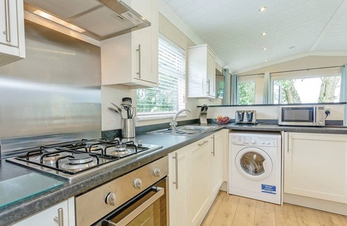 Hawes Cottage | Shepherd’s Hut with an open plan design with king-size bed.