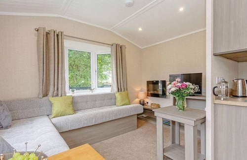 Hawes Cottage | Shepherd’s Hut with an open plan design with king-size bed.