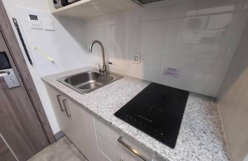 Malabanias Apartment | Sheryll Escapes - 1109, Phase 2 La Grande, breezy, hotel amenities!