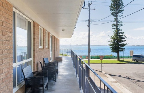 Shoal Bay Apartment | Shoal Towers, unit 1 11 Shoal Bay Road - fantastic unit across the road from beach with Wi-Fi
