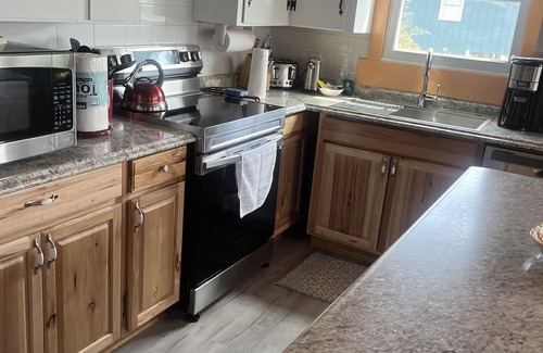 Long Beach House | Short term rentals welcome. Steps to the beach. Pet friendly, fenced yard.