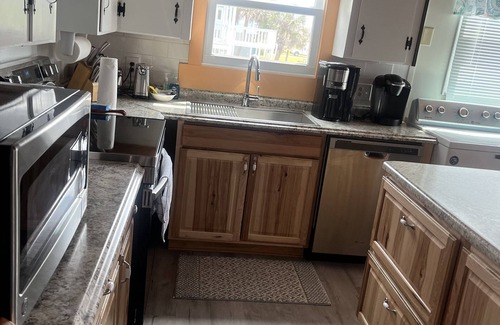 Long Beach House | Short term rentals welcome. Steps to the beach. Pet friendly, fenced yard.
