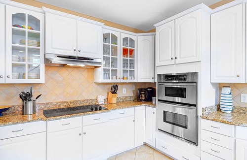 Sunset Island House | Side-by-side homes with bay views, resort pools, tennis, & gym - near beach