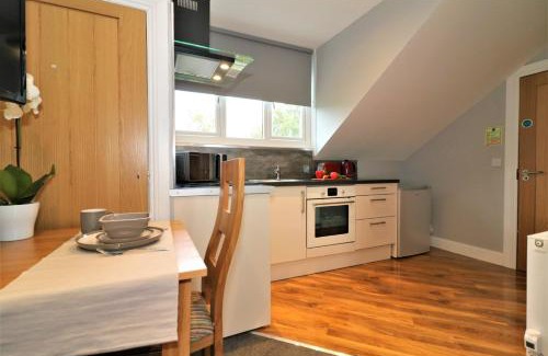 Airdrie Apartment | Signature - Linden Cottage Room 4