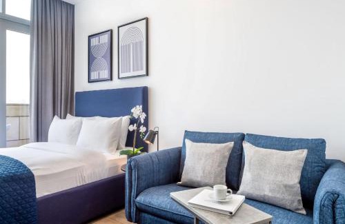 Bur Dubai Apartment | Silkhaus modish studio with Burj Khalifa view, pool access