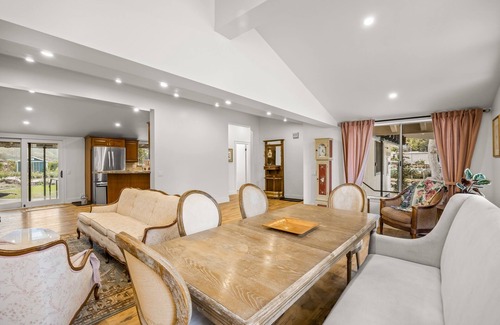 Fillmore House | Single-level home surrounded by lush gardens with a washer/dryer, AC, & wet bar