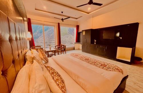 Daltenganj Hotel | Sitara Scenic Mountain View Hotel & Resort, Mussoorie - luxury Rooms with open Rooftop Cafe