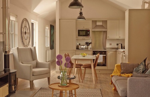 Rookley Ski Chalet | Situated around the lake.