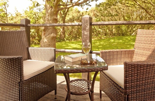 Rookley Ski Chalet | Situated around the lake.