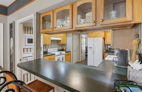 Osage Beach House | Six Suites with Hot Tubs, Private Jacuzzi Baths, Wooded Garden and Lake Access with Boat Slip