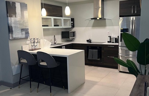 New Kingston Apartment | Skai’s executive suite with pool