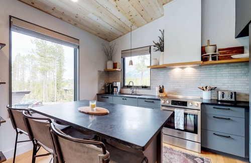 Big Sky Cabin | Ski-in/ski-out cabin with lake view, private hot tub, & WiFi