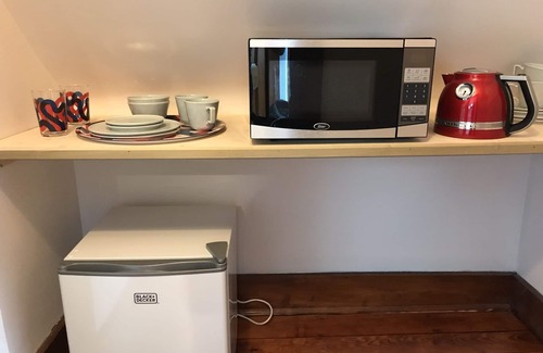 Egleston Square House | Skylit Suite in Musical home