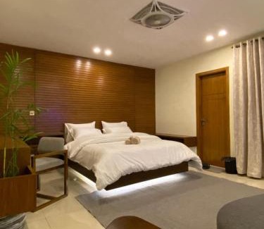 Islamabad Apartment | Skyluxe Designer Studio with rooftop Pool & Self Check In