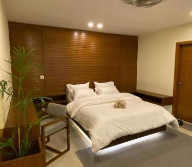 Islamabad Apartment | Skyluxe Designer Studio with rooftop Pool & Self Check In