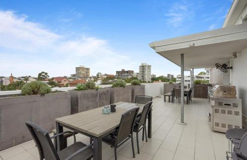 New Farm Apartment | Sleek 2-Bed with Balcony and Communal BBQ Area